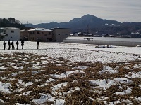 ほ場での飛行実演の写真