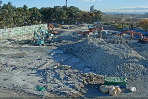 重機と砂の山の写真